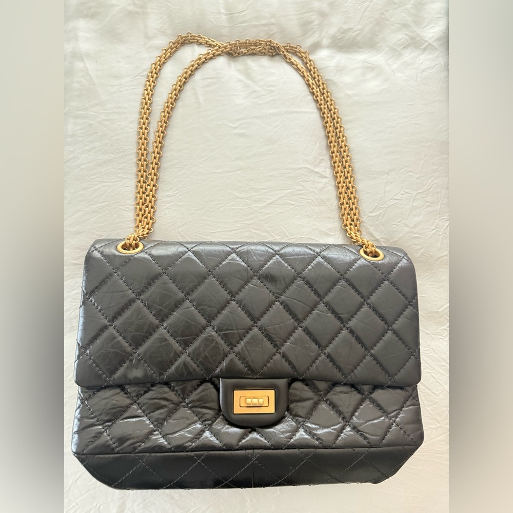 CHANEL Black and Gold Quilted Shoulder Bag with Chain Strap